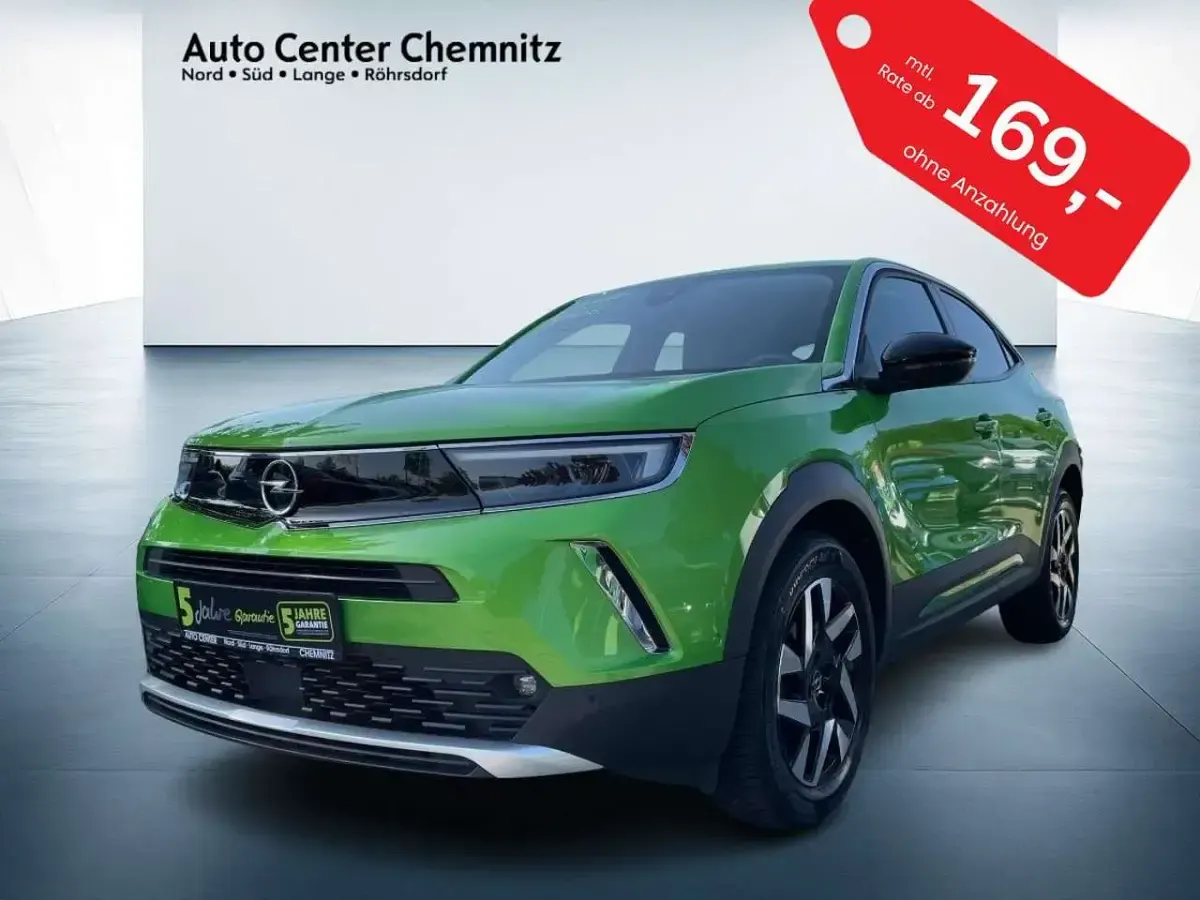 Gebraucht Opel Mokka Elegance 101 PS (74 kW) 2023 Matcha green SUV