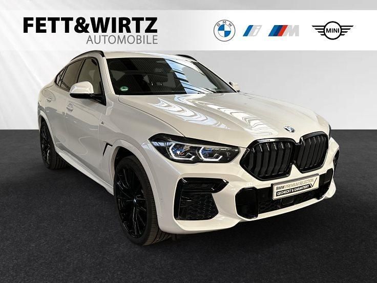 Mineralweiss metallic Gebraucht 2022 BMW X6 M Sport SUV | 72.690 € (Etwas zu teuer) - Bild 1/3