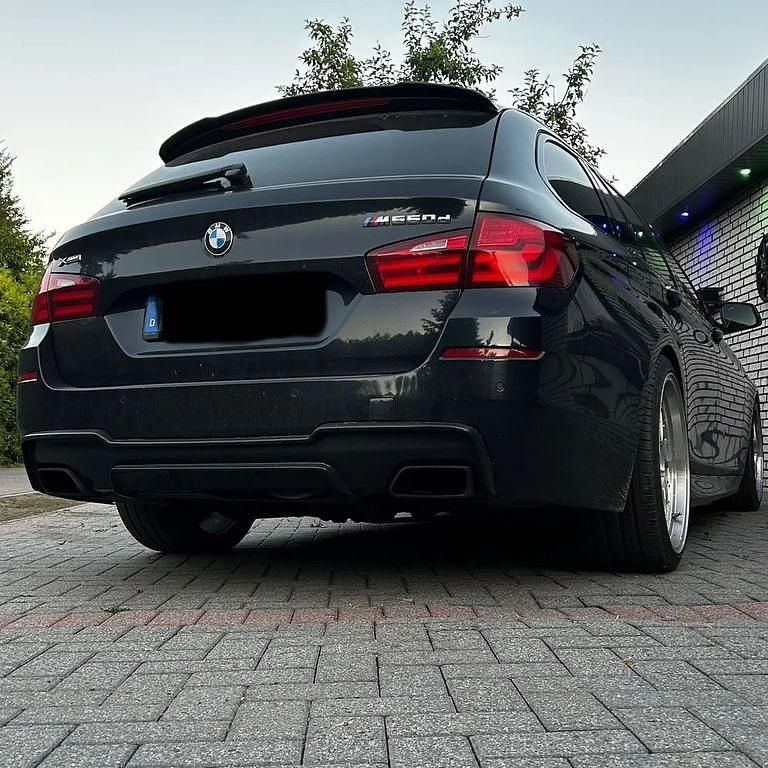 Schwarz Gebraucht 2012 BMW M550 Sport Line Limousine | 15.100 € - Bild 1/4