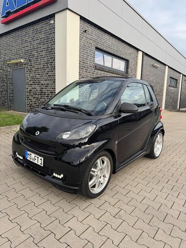 Schwarz Gebraucht 2010 Smart ForTwo Cabrio Brabus Cabrio | 9.900 € - Bild 1/4