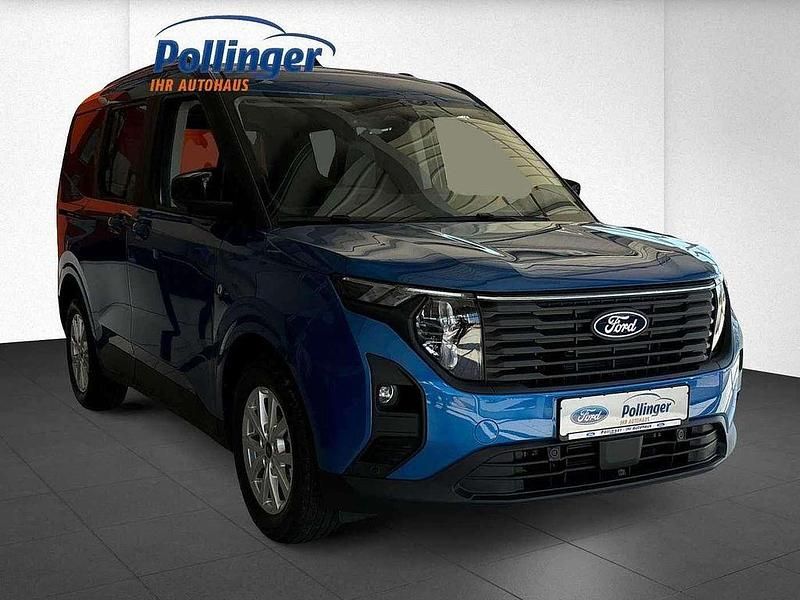 Gebraucht Ford Tourneo Courier Titanium 125 PS (91 kW) 2024 Desert island blue metallic Van / Kleinbus