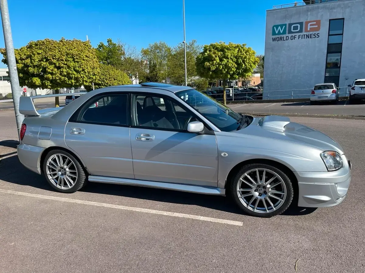 Second-hand Subaru Impreza 300 CP (220 kW) 2003 Argintiu Berlinǎ
