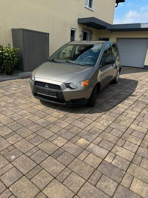 Grau Gebraucht 2009 Mitsubishi Colt Van / Kleinbus | 3.999 € (Fairer Preis) - Bild 1/4