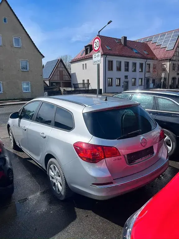 Używany Opel Astra Style 140 KM (102 kW) 2015 Srebrny Kombi