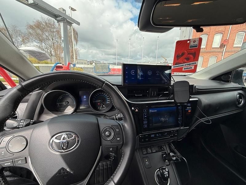 Gebraucht Toyota Auris Hybrid 100 PS (73 kW) 2016 Blau Kombi