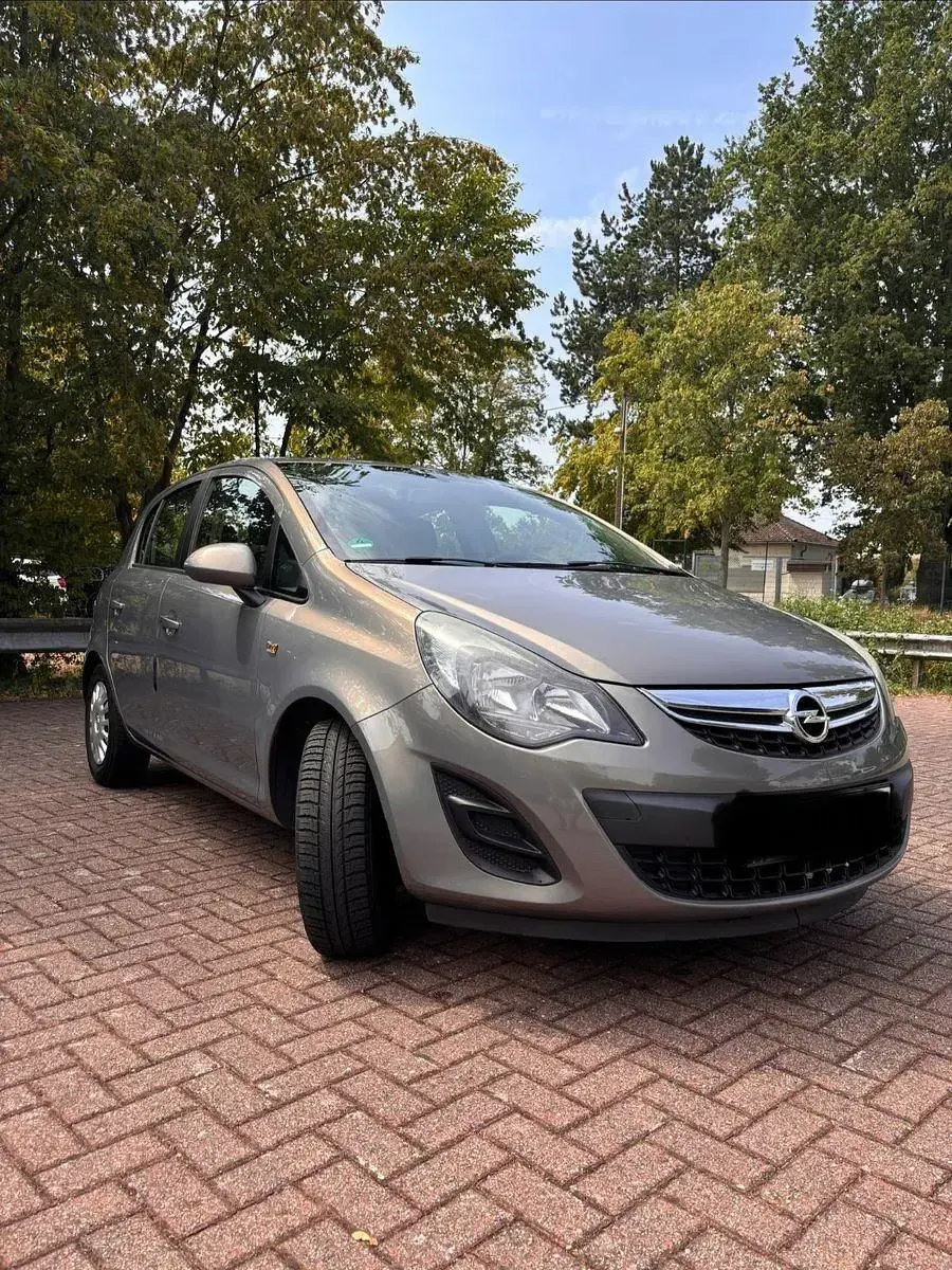 Gebraucht Opel Corsa Edition 87 PS (63 kW) 2013 Braun Kleinwagen