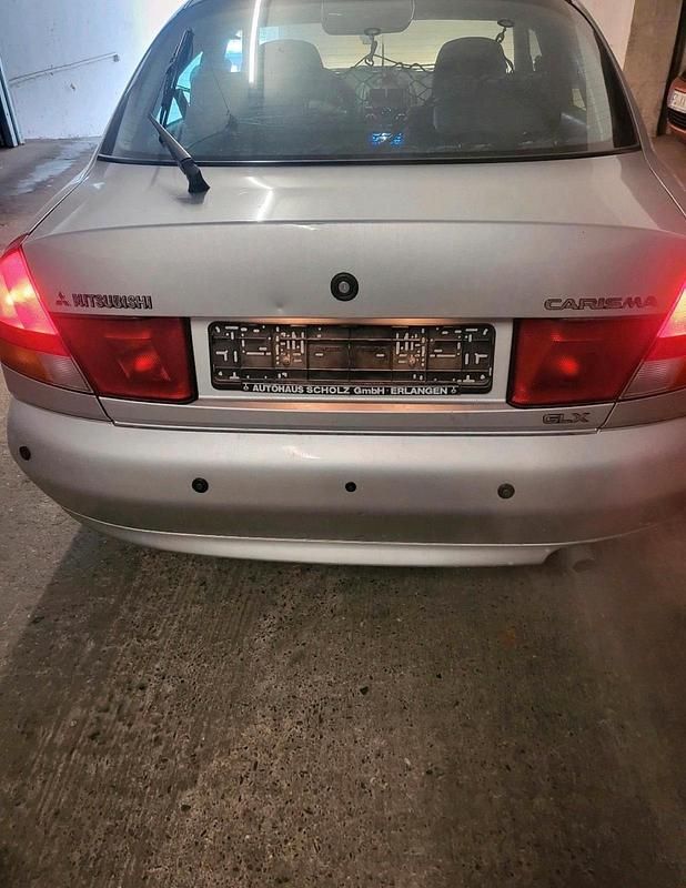 Gebraucht Mitsubishi Carisma 90 PS (66 kW) 1998 Grau Limousine