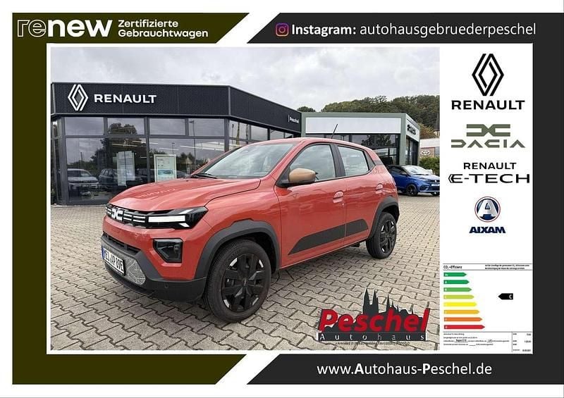Brickred Gebraucht 2025 Dacia Spring Extreme Kleinwagen | 16.890 € (Guter Preis) - Bild 1/4