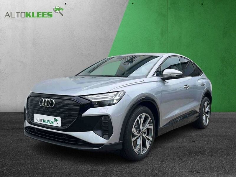 Florettsilber metallic Gebraucht 2023 Audi Q4 Sportback e-tron Sport SUV | 48.990 € - Bild 1/4