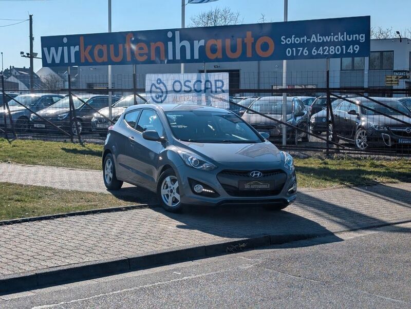Grau Gebraucht 2014 Hyundai i30 Classic Coupé | 6.499 € (Fairer Preis) - Bild 1/4