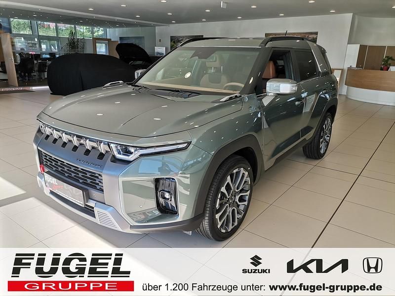 Forest green Neu 2025 Ssangyong Torres SUV | 29.899 € - Bild 1/4