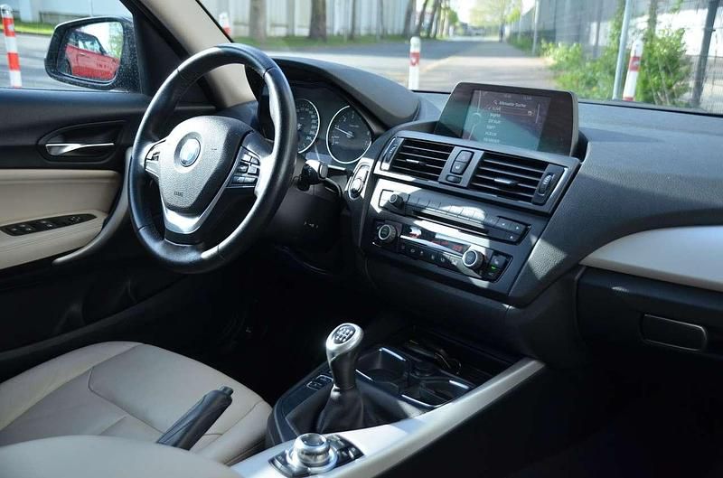 Gebraucht BMW 114 102 PS (75 kW) 2014 Black sapphire metallic Kleinwagen
