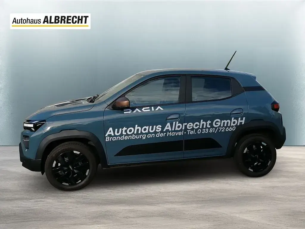 Gebraucht Dacia Spring Extreme 47 kW (65 PS) 2025 Schieferblau Kleinwagen