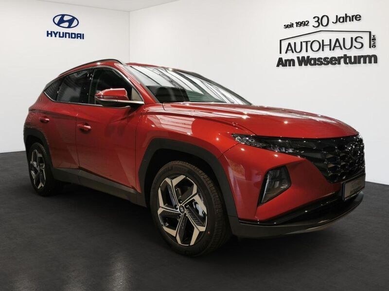 Gebraucht Hyundai Tucson Basis 265 PS (194 kW) 2023 Sunset red / mic (rot) SUV
