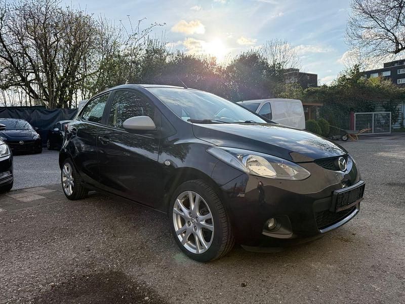 Gebraucht Mazda 2 Independence 86 PS (63 kW) 2009 Braun Kleinwagen