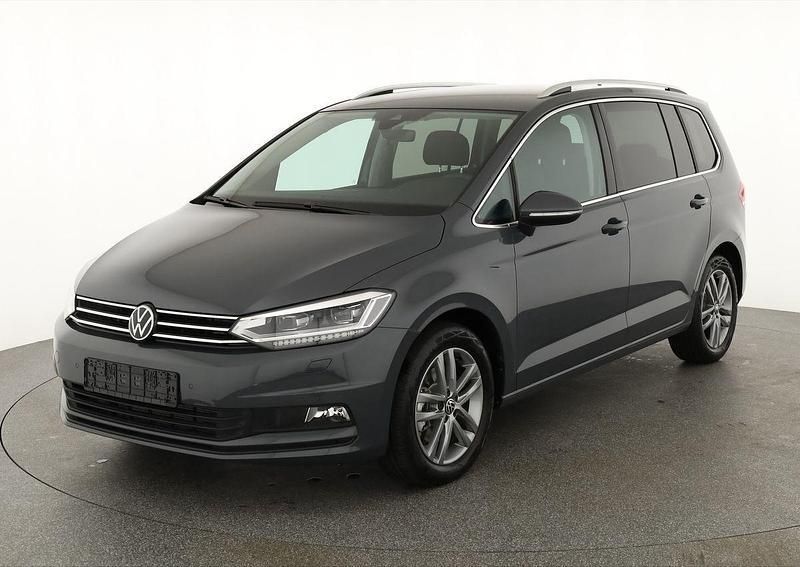 Delfingrau metallic Gebraucht 2025 VW Touran Comfortline Van / Kleinbus | 37.495 € (Fairer Preis) - Bild 1/4