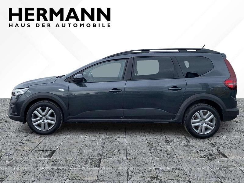 Gebraucht Dacia Jogger Expression 110 PS (80 kW) 2023 Kometengrau (grau) Van / Kleinbus