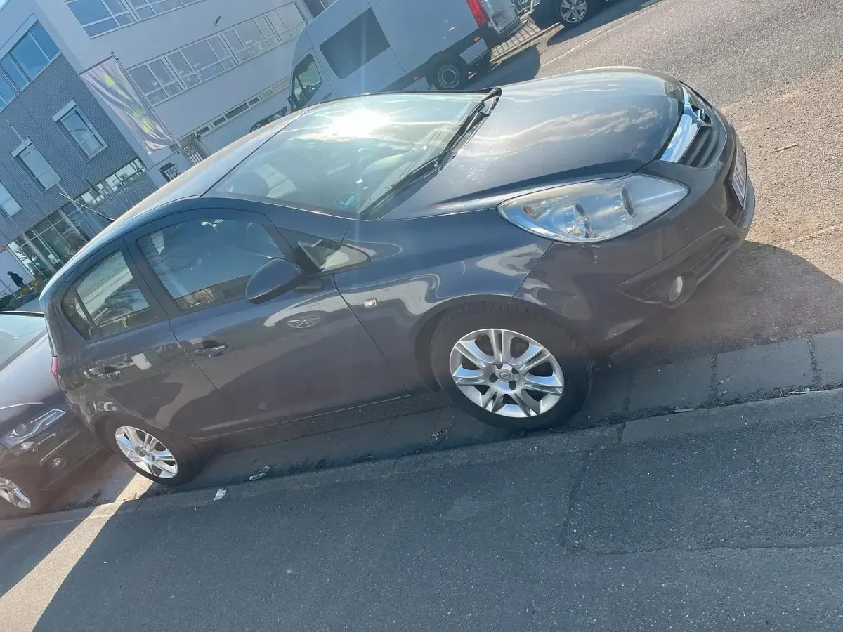 Używany Opel Corsa 90 KM (66 kW) 2009 Niebieski Hatchback