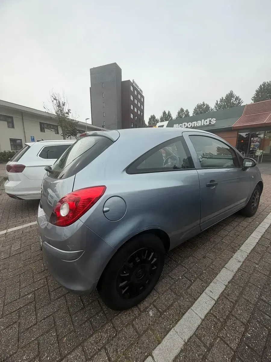 Gebraucht Opel Corsa 60 PS (44 kW) 2009 Grau Kleinwagen