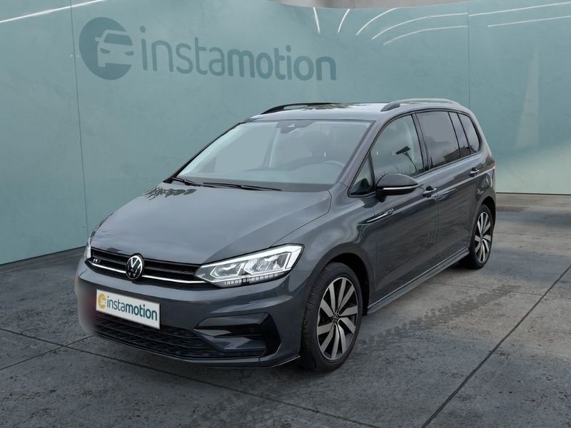 Grau Gebraucht 2024 VW Touran Pro Van / Kleinbus | 38.599 € (Fairer Preis) - Bild 1/4
