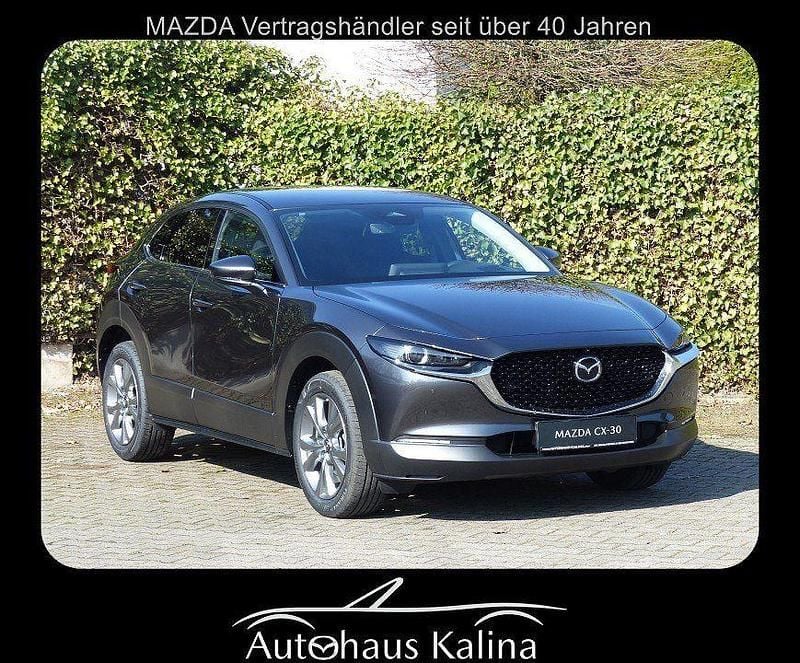 Machine gray Neu 2025 Mazda CX-30 Exclusive-Line SUV | 29.990 € - Bild 1/4