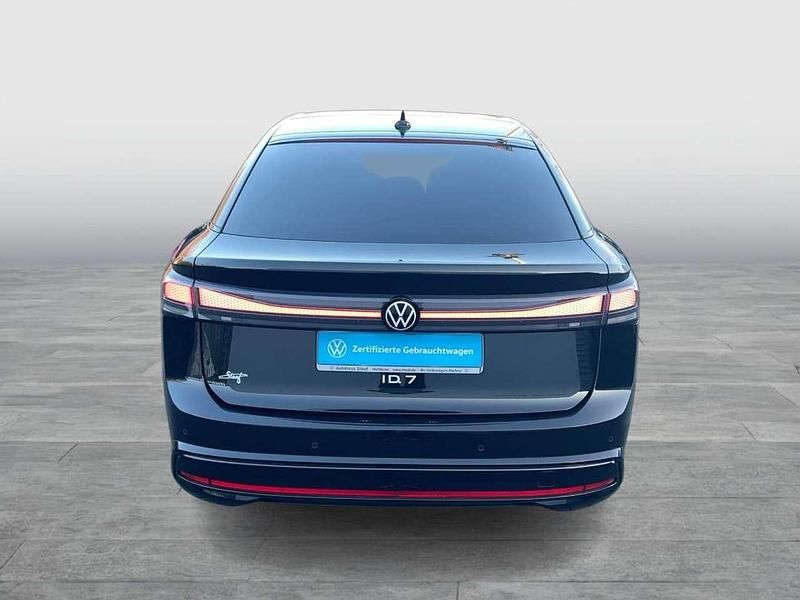 Gebraucht VW ID.7 Pro 210 kW (286 PS) 2023 Grenadillschwarz metallic Kleinwagen