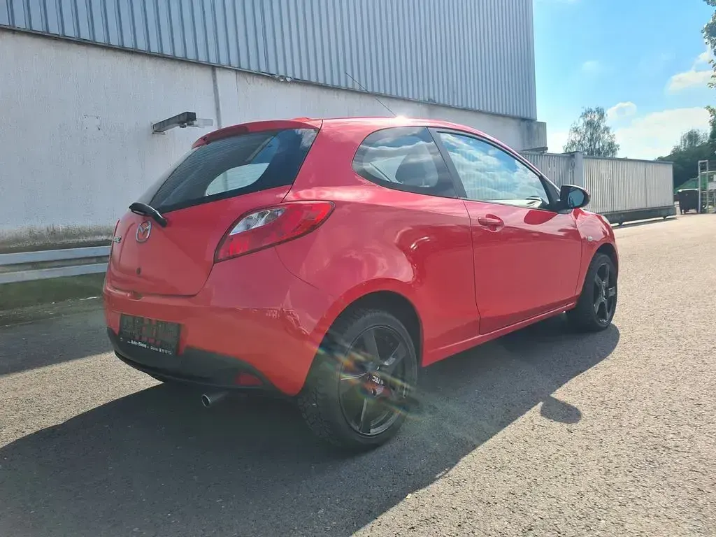 Gebraucht Mazda 2 Inclusive 86 PS (63 kW) 2009 Rot Kleinwagen