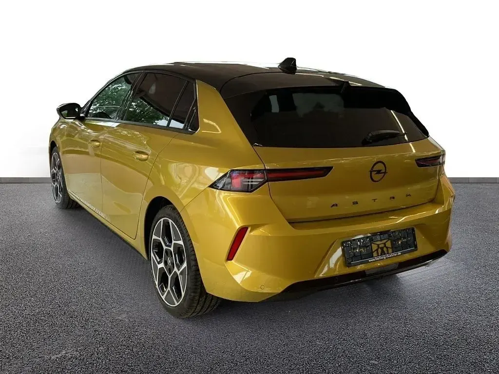 Gebraucht Opel Astra 131 PS (96 kW) 2023 Amber yellow/typ aussenverklei Kleinwagen