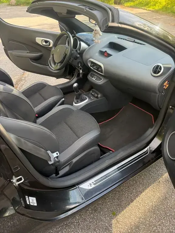 Gebraucht Renault Wind Dynamique 102 PS (75 kW) 2011 Schwarz Kleinwagen