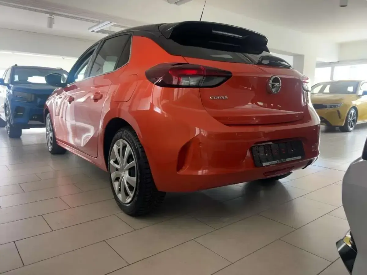 Gebraucht Opel Corsa Elegance 101 PS (74 kW) 2023 Power orange/dynamik orange Kleinwagen