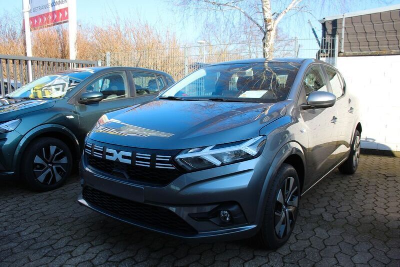 Grau Neu 2025 Dacia Sandero Expression Kleinwagen | 17.140 € (Fairer Preis) - Bild 1/4