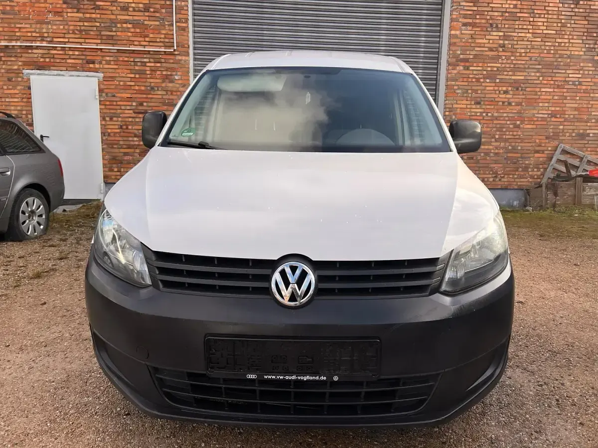 Używany VW Caddy 102 KM (75 kW) 2014 Biały Minivan