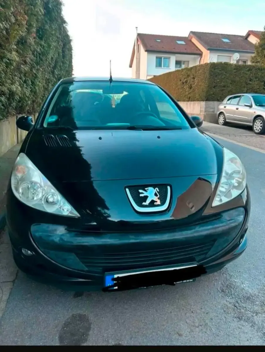Gebraucht Peugeot 206+ 75 PS (55 kW) 2009 Schwarz Kleinwagen