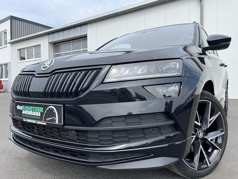 Schwarzmagic Gebraucht 2021 Skoda Karoq SportLine SUV | 28.860 € (Guter Preis) - Bild 1/4