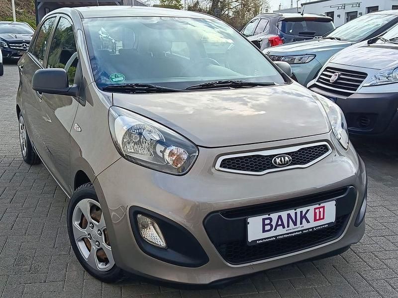 Gebraucht Kia Picanto Attract 69 PS (50 kW) 2014 Braun Kleinwagen