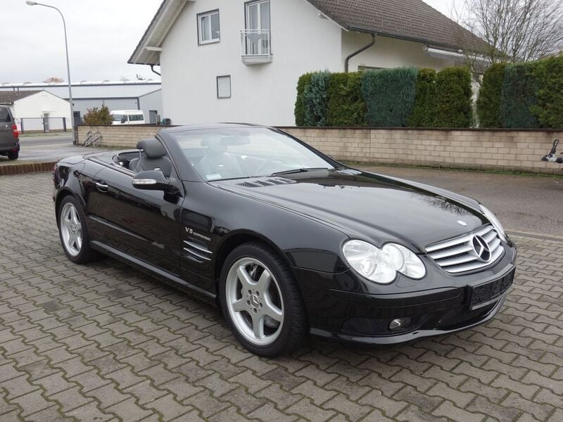 Schwarz unilack (metallic) Gebraucht 2003 Mercedes SL55 AMG AMG Cabrio | 30.890 € - Bild 1/4