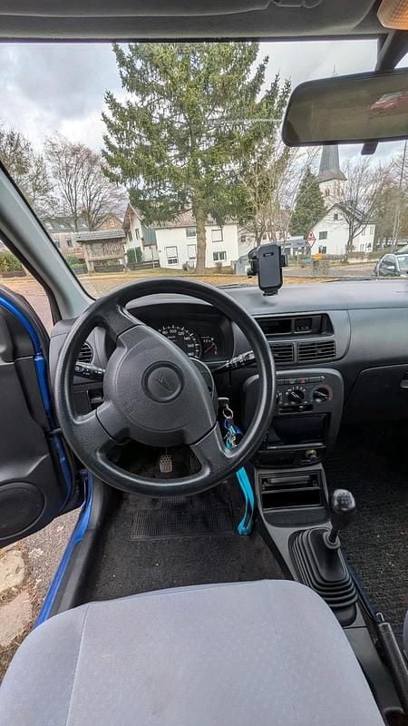 Gebraucht Daihatsu Cuore 58 PS (42 kW) 2003 Blau Kleinwagen