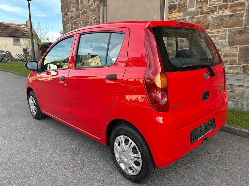 Gebraucht Daihatsu Cuore 69 PS (50 kW) 2008 Rot Kleinwagen