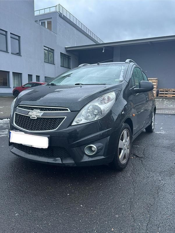 Schwarz Gebraucht 2011 Chevrolet Spark Kleinwagen | 2.300 € (Fairer Preis) - Bild 1/4