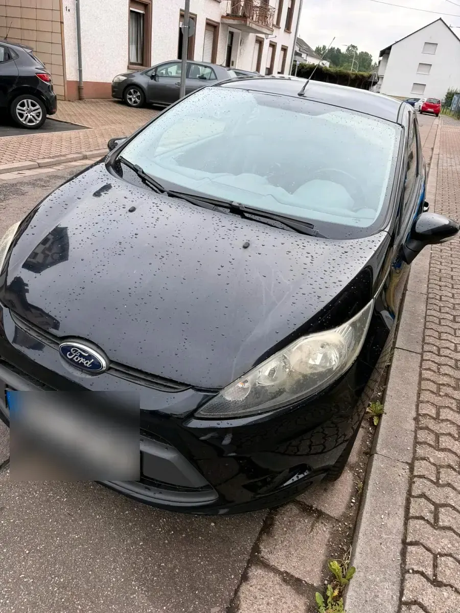 Gebraucht Ford Fiesta 60 PS (44 kW) 2010 Schwarz Kleinwagen