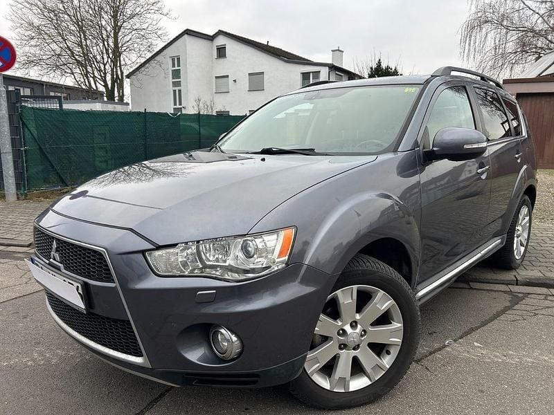 Grau Gebraucht 2012 Mitsubishi Outlander SUV | 4.800 € (Superpreis) - Bild 1/4