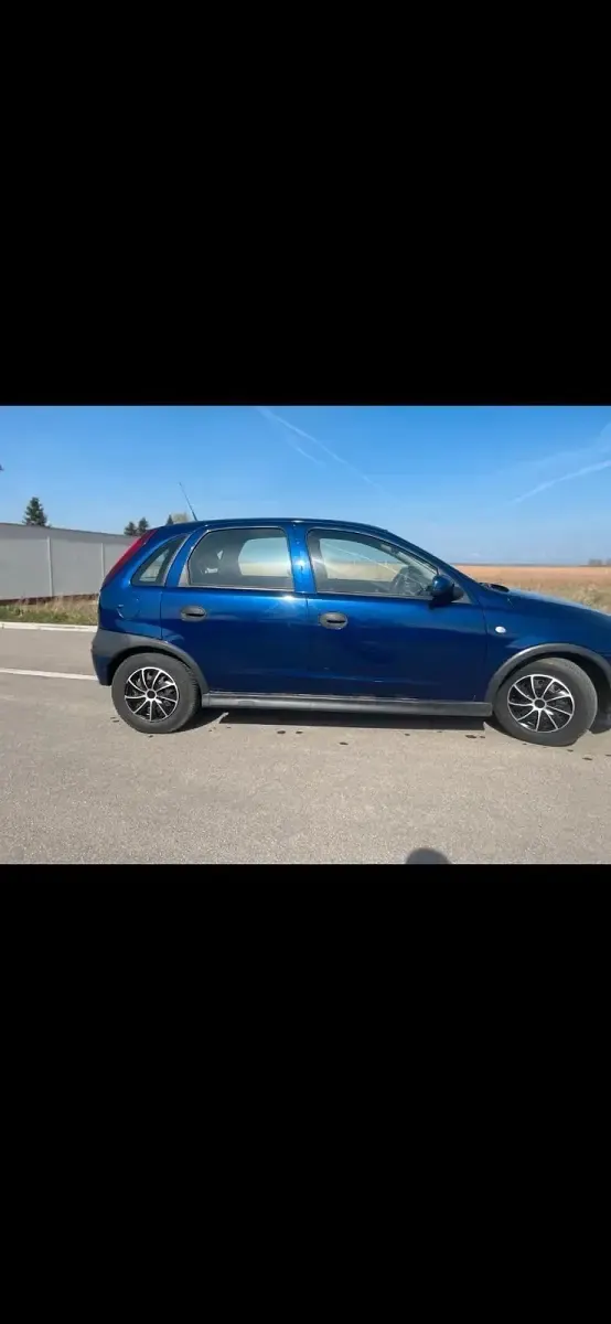 Używany Opel Corsa 75 KM (55 kW) 2003 Niebieski Hatchback