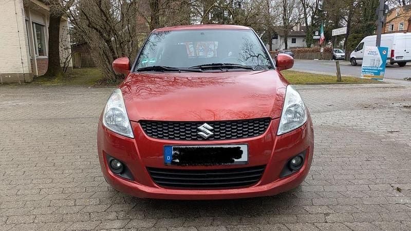 Usado Suzuki Swift Basic 94 HP (69 kW) 2011 Laranja Citadino