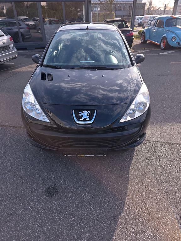 Gebraucht Peugeot 206 73 PS (53 kW) 2011 Schwarz Limousine