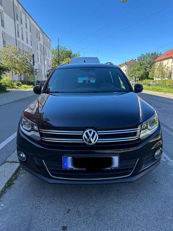Gebraucht VW Tiguan Cup 122 PS (89 kW) 2014 Schwarz SUV