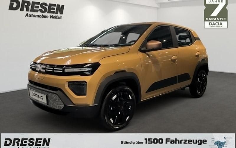 Brick red Neu 2025 Dacia Spring Extreme Kleinwagen | 17.790 € (Fairer Preis) - Bild 1/4