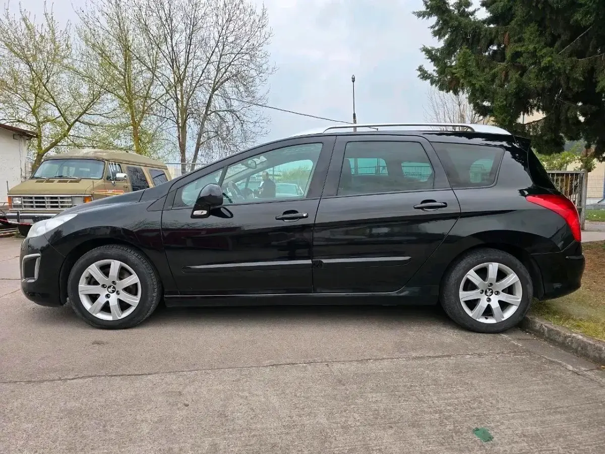 Gebraucht Peugeot 308 SW 156 PS (114 kW) 2011 Schwarz Kombi