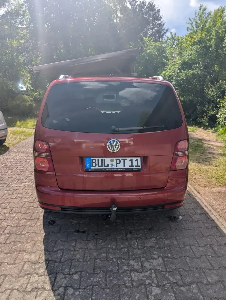 Używany VW Touran 140 KM (102 kW) 2007 Czerwony Minivan