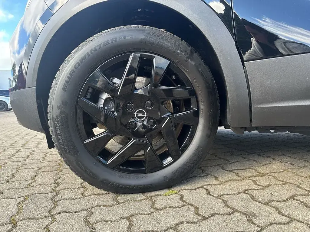 Gebraucht Opel Mokka-e GS Line 100 kW (136 PS) 2024 Lackierung schwarz perla nera/ SUV