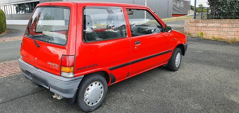 Rot Gebraucht 1989 Daihatsu Cuore Kleinwagen | 2.199 € - Bild 1/4